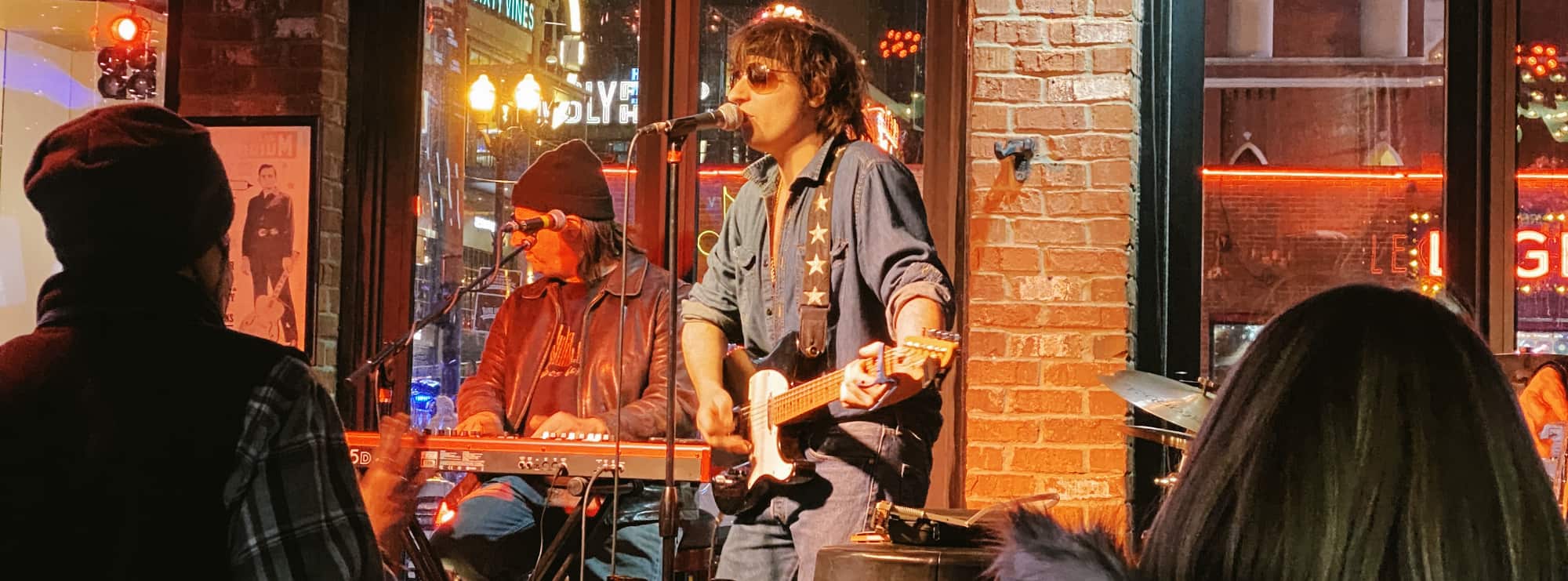 bar singer on guitar in Toledo